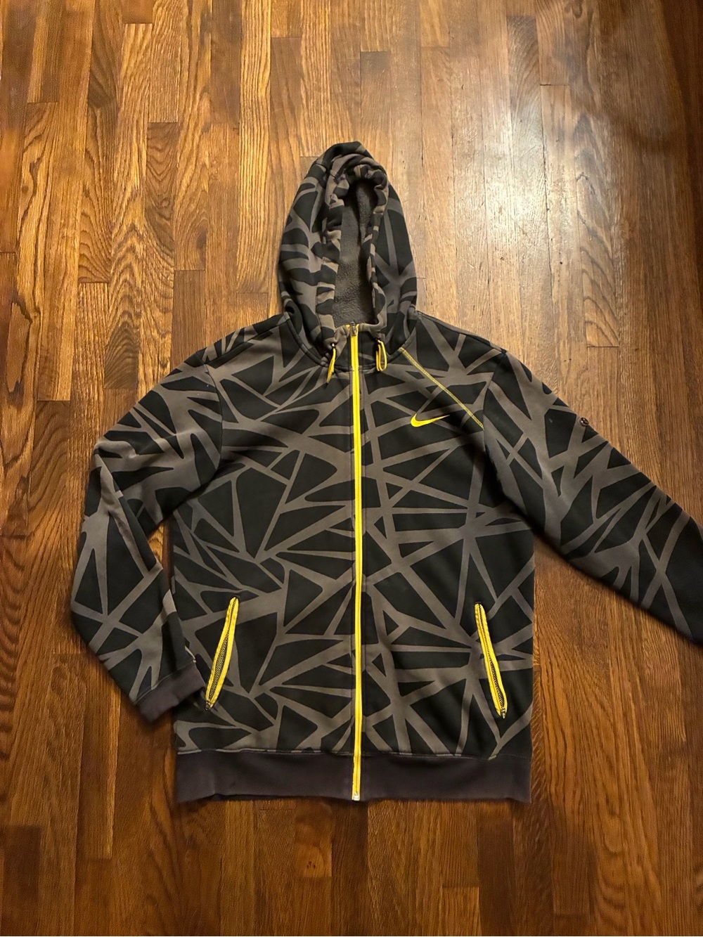 Nike Men’s Black & Gray Geometric Hooded Zip Jacket with Yellow Accents